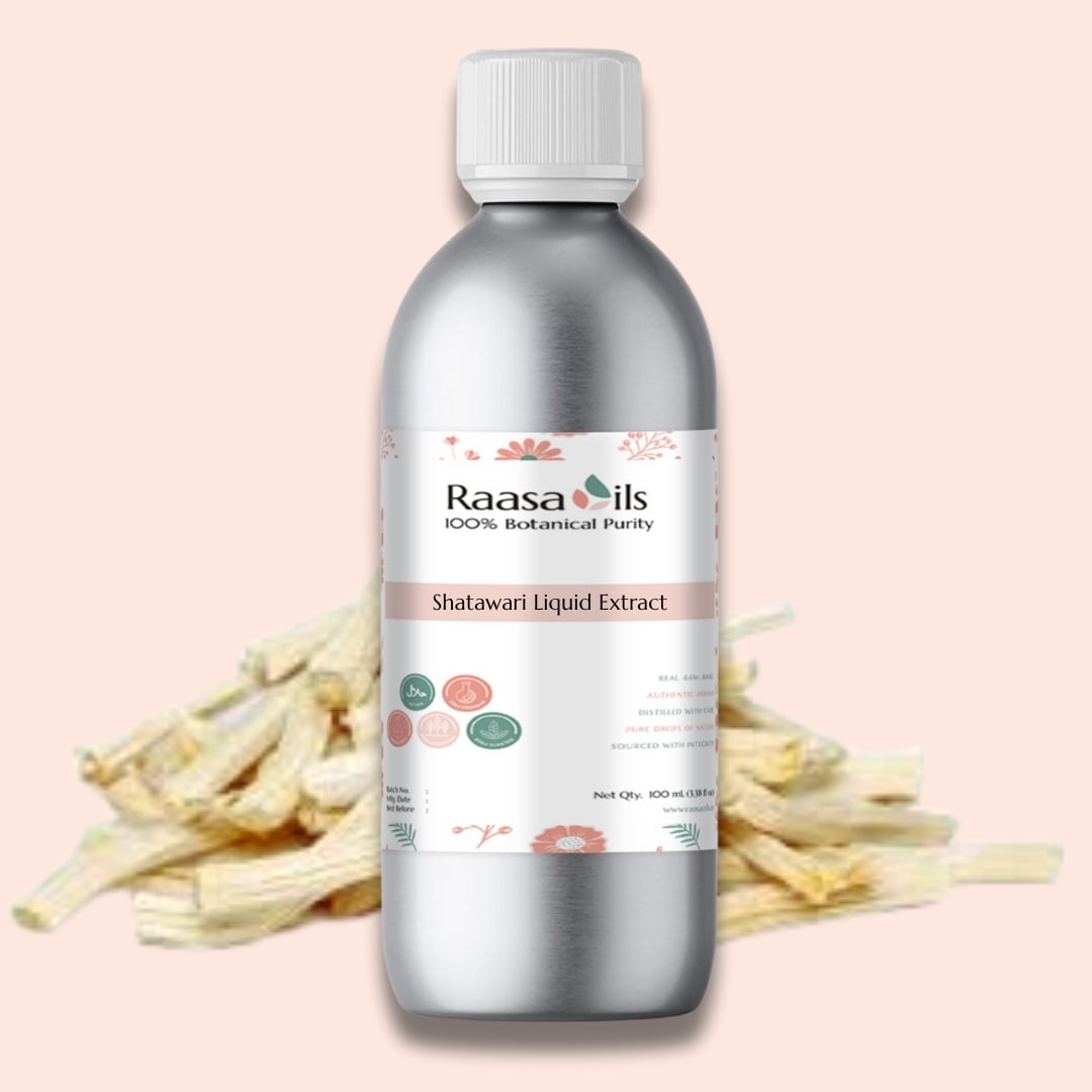 Bottle of Raasa Oils Shatawari Liquid Extract with dried shatawari roots on a light pink background