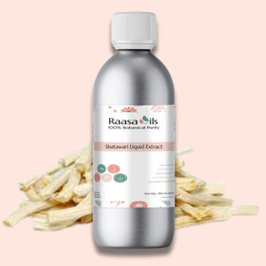 Bottle of Raasa Oils Shatawari Liquid Extract with dried shatawari roots on a light pink background