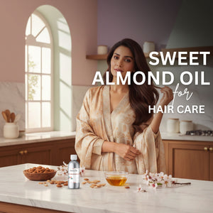 Woman in a kitchen with sweet almond oil for hair care products on a counter.