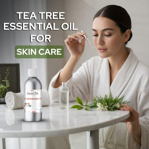 Woman using tea tree essential oil for skin care with a bottle of the product on a table.