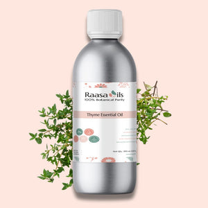 Raasa Oils thyme essential oil bottle with a pink background