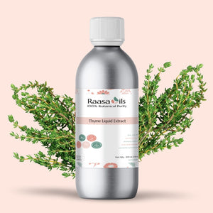 Bottle of Raasa Oils Thyme Liquid Extract with thyme branches on a light pink background