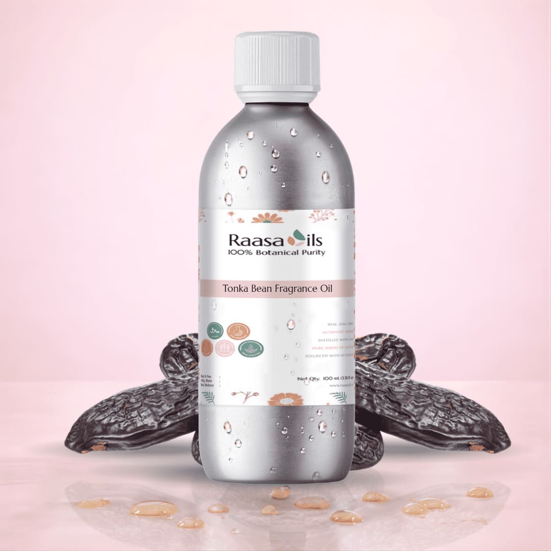 Bottle of Raasa Oils Torka Bean Fragrance Oil with dried fruits on a pink background