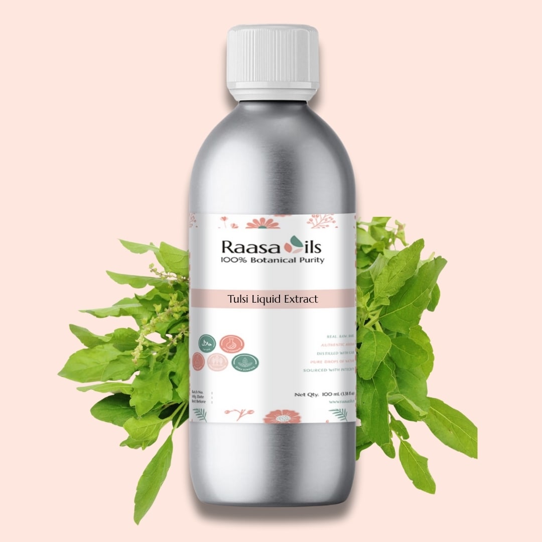 Bottle of Raasa Oils Tulsi Liquid Extract with green leaves on a pink background