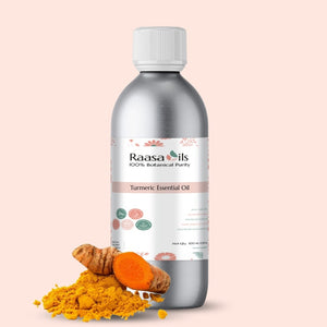 Raasa Oils Turmeric Essential Oil bottle with turmeric powder and root on a light pink background