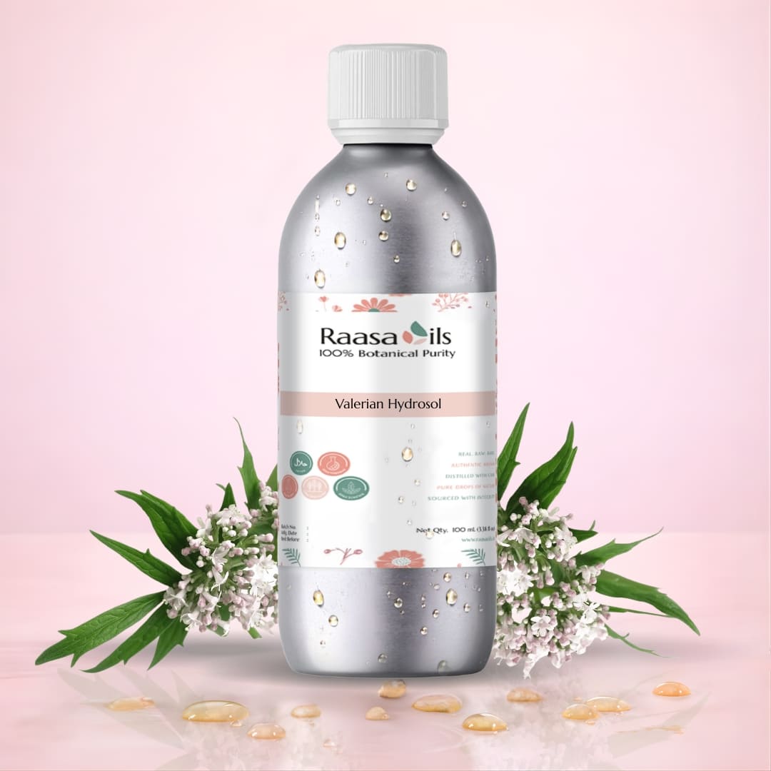 Raasa Oils Valerian Hydrosol bottle with flowers on a pink background