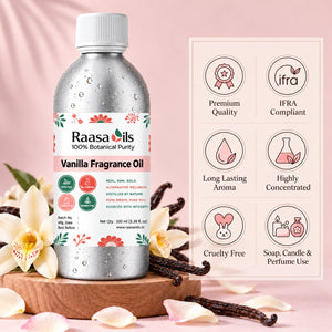A bottle of Raasa Oils Vanilla Fragrance Oil with a silver metallic body and white cap, displayed on a wooden board with vanilla beans and flower petals against a soft pink background. A feature infographic card is shown to the right.