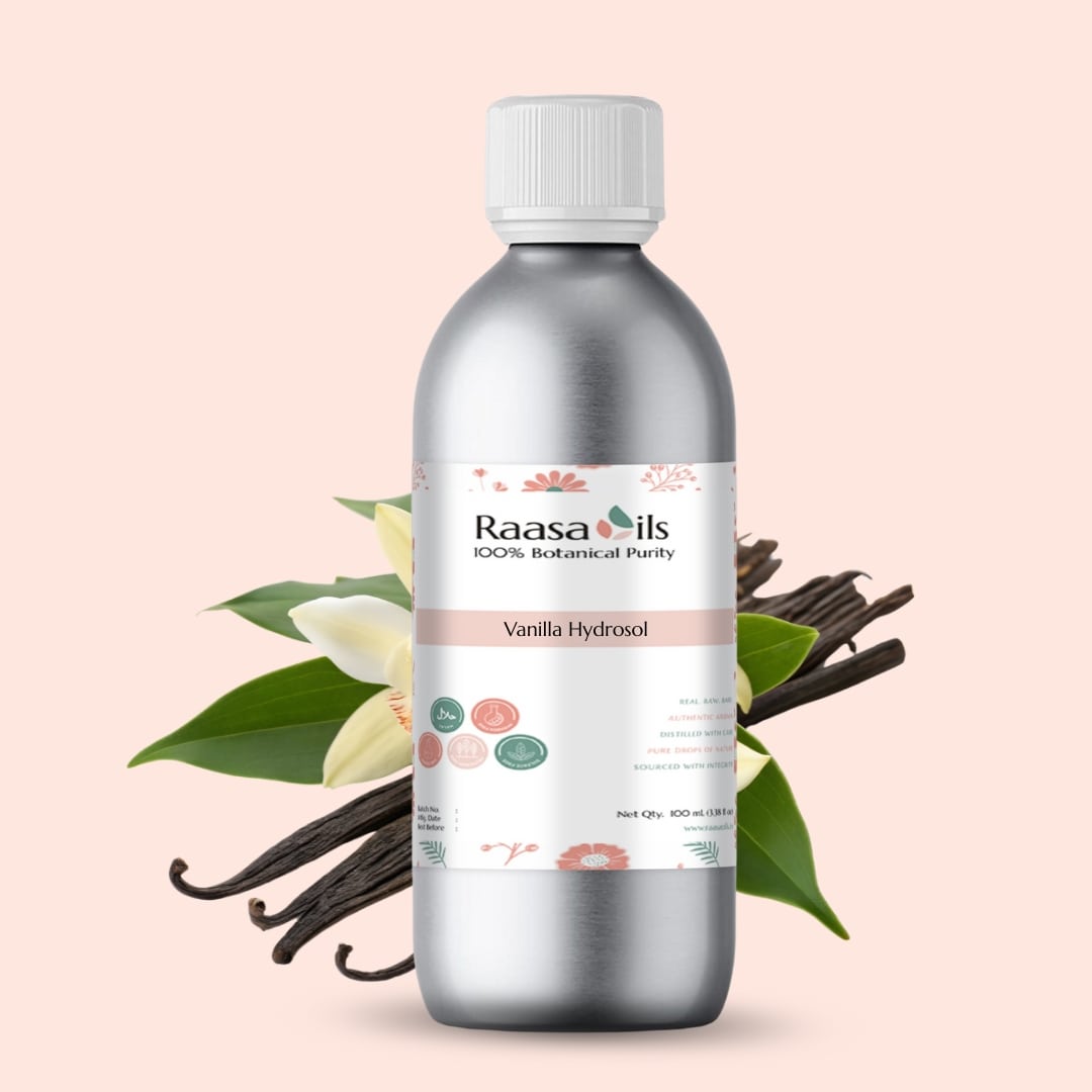 Bottle of Raasa Oils Vanilla Hydrosol with vanilla beans and flowers on a light pink background