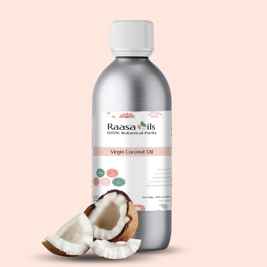 Bottle of Raasa Oils Virgin Coconut Oil with a half-coconut on a light pink background
