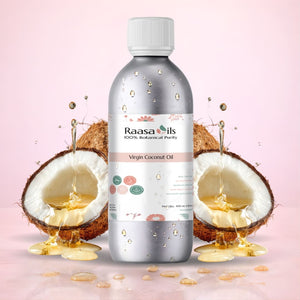Bottle of Raasa Oils Virgin Coconut Oil with coconuts and oil splashes on a pink background