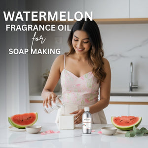 Woman in a kitchen preparing soap with watermelon fragrance oil, surrounded by watermelons.