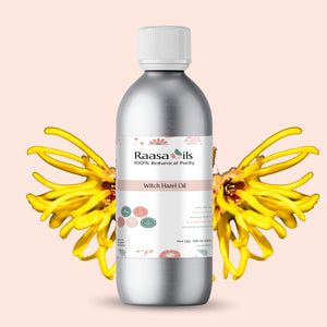 Bottle of Raasa Oils Witch Hazel Oil with yellow flowers on a pink background