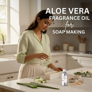 Woman in a kitchen preparing soap with aloe vera and fragrance oil, text 'Aloe Vera Fragrance Oil for Soap Making' displayed.