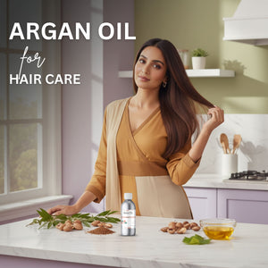 Woman with long hair standing in a kitchen with argan oil products.