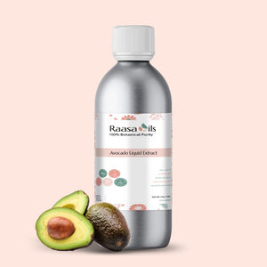 Bottle of Raasa Oils Avocado Liquid Extract with two avocados on a beige background