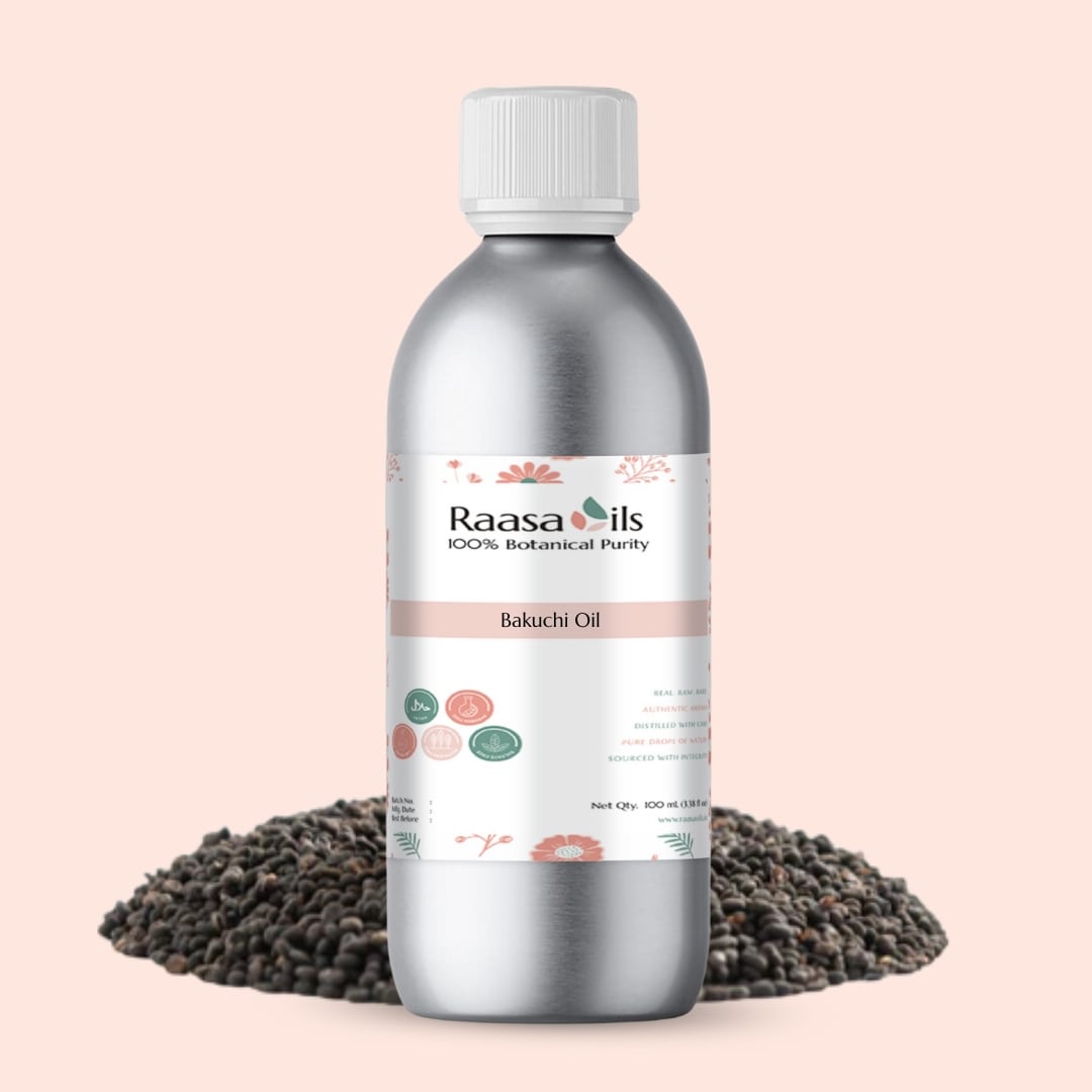 Bottle of Raasa Oils Bakuchi Oil with seeds on a light pink background