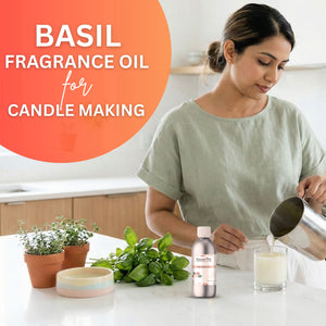 Woman making candles with basil fragrance oil in a kitchen setting
