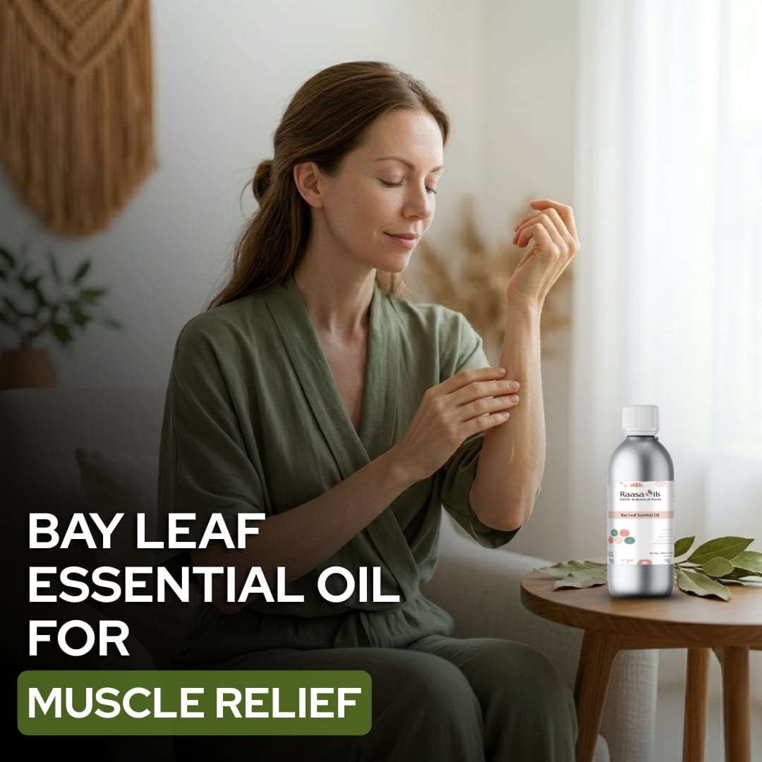 Woman applying Bay Leaf Essential Oil to her arm with a bottle of the product on a table.