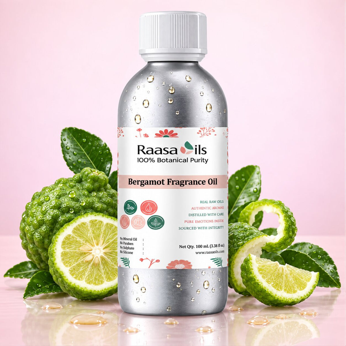 A bottle of Raasa Oils Bergamot Fragrance Oil centered on a pink background, surrounded by bergamot fruits and green leaves. The bottle is metallic silver with a white cap and a white label featuring pink and green accents.