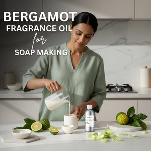 Woman in a kitchen preparing soap with bergamot fragrance oil, surrounded by ingredients.