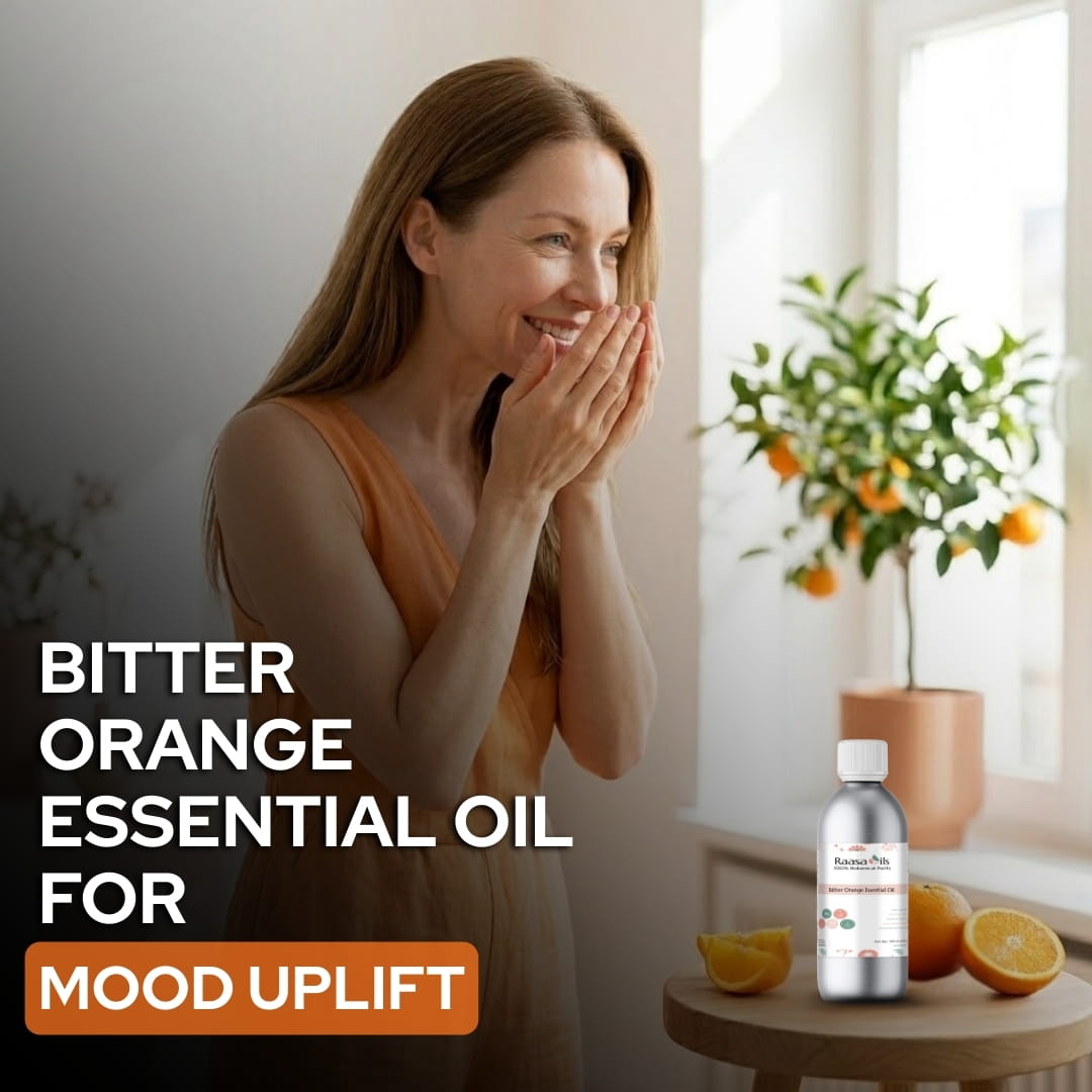 Woman with a happy expression in a room with a bottle of bitter orange essential oil on a table.
