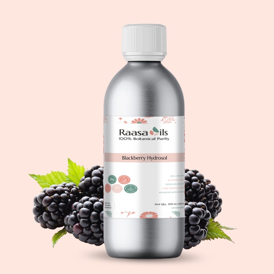 Bottle of Raasa Oils Blackberry Hydrofolol with blackberries and leaves on a light pink background