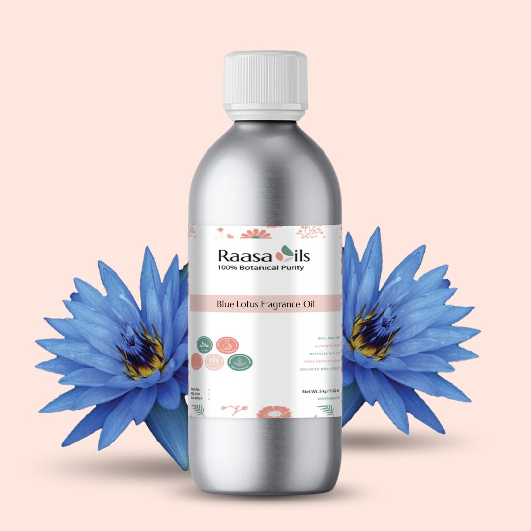 Bottle of Raasa Oils Blue Lotus Fragrance Oil with blue lotus flowers on a beige background