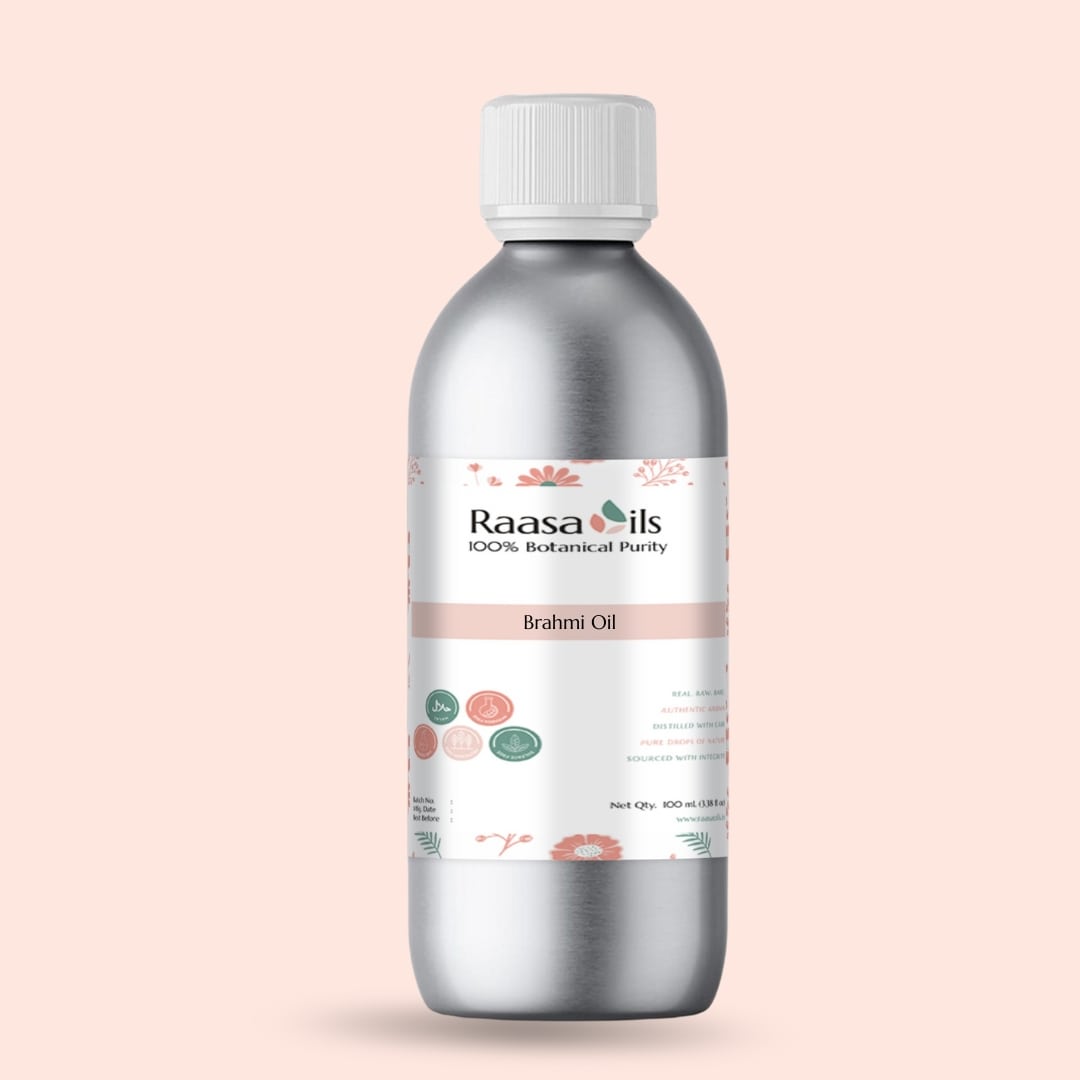 Bottle of Raasa Oils Brahmi Oil on a light pink background