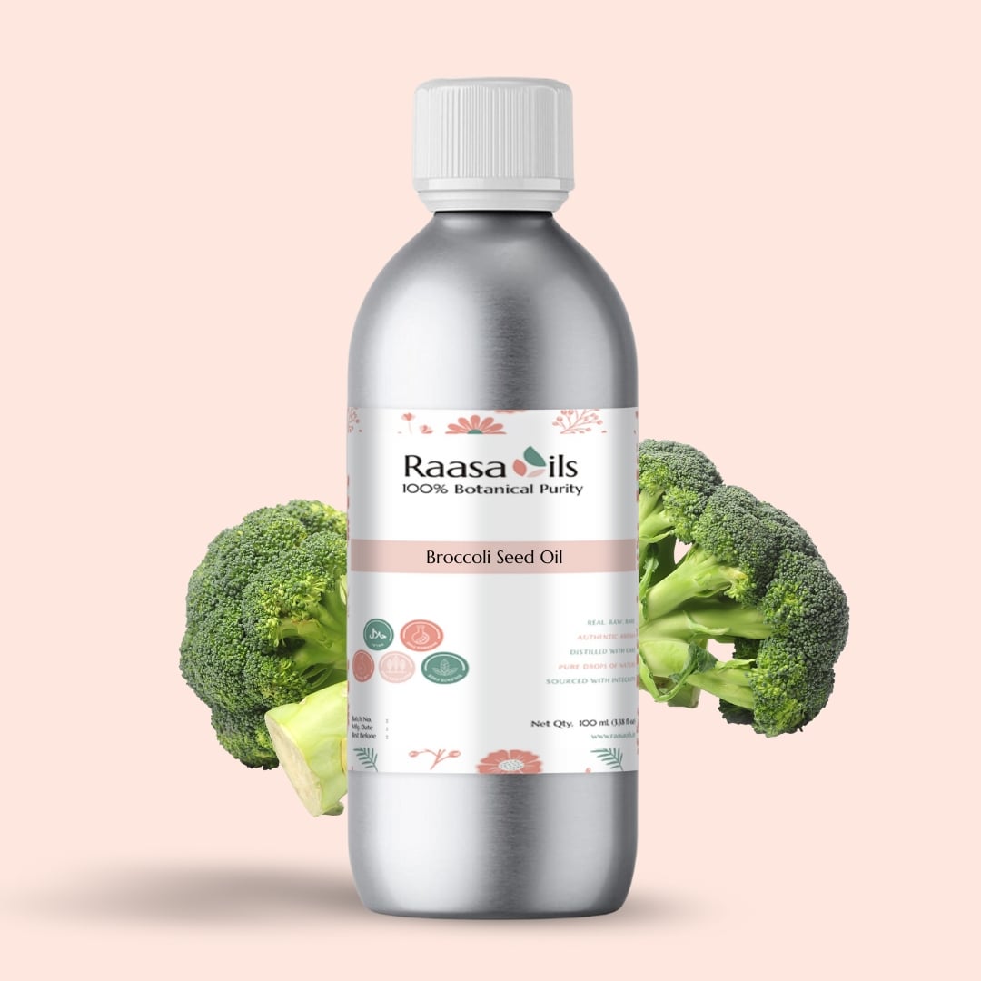 Bottle of Raasa Oils Broccoli Seed Oil with broccoli on a pink background