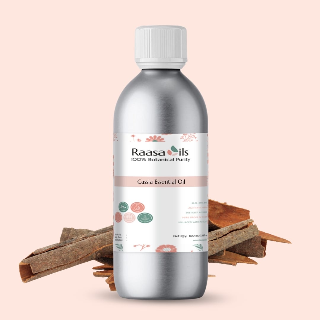 Raasa Oils Cassia Essential Oil bottle with cinnamon sticks on a beige background