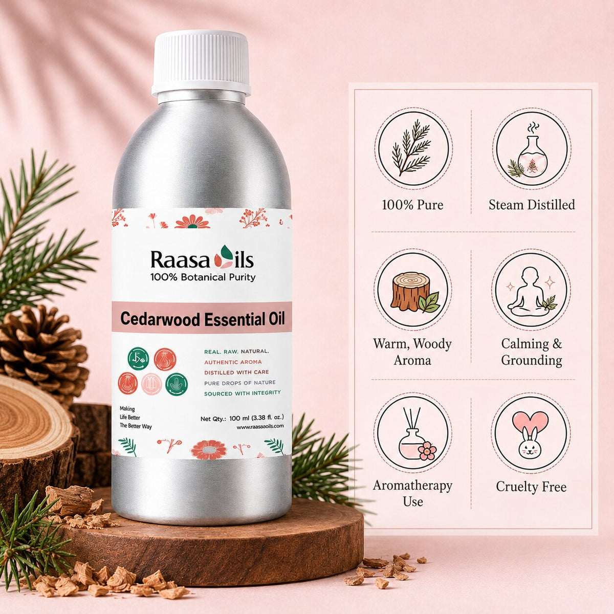 A bottle of Raasa oils Cedarwood Essential Oil displayed on a wooden slice pedestal with pine branches and wood chips, next to a graphic card detailing product benefits on a soft pink background.