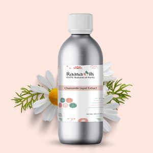 Bottle of Raasa Oils Chamomile Liquid Extract with a daisy flower on a light pink background