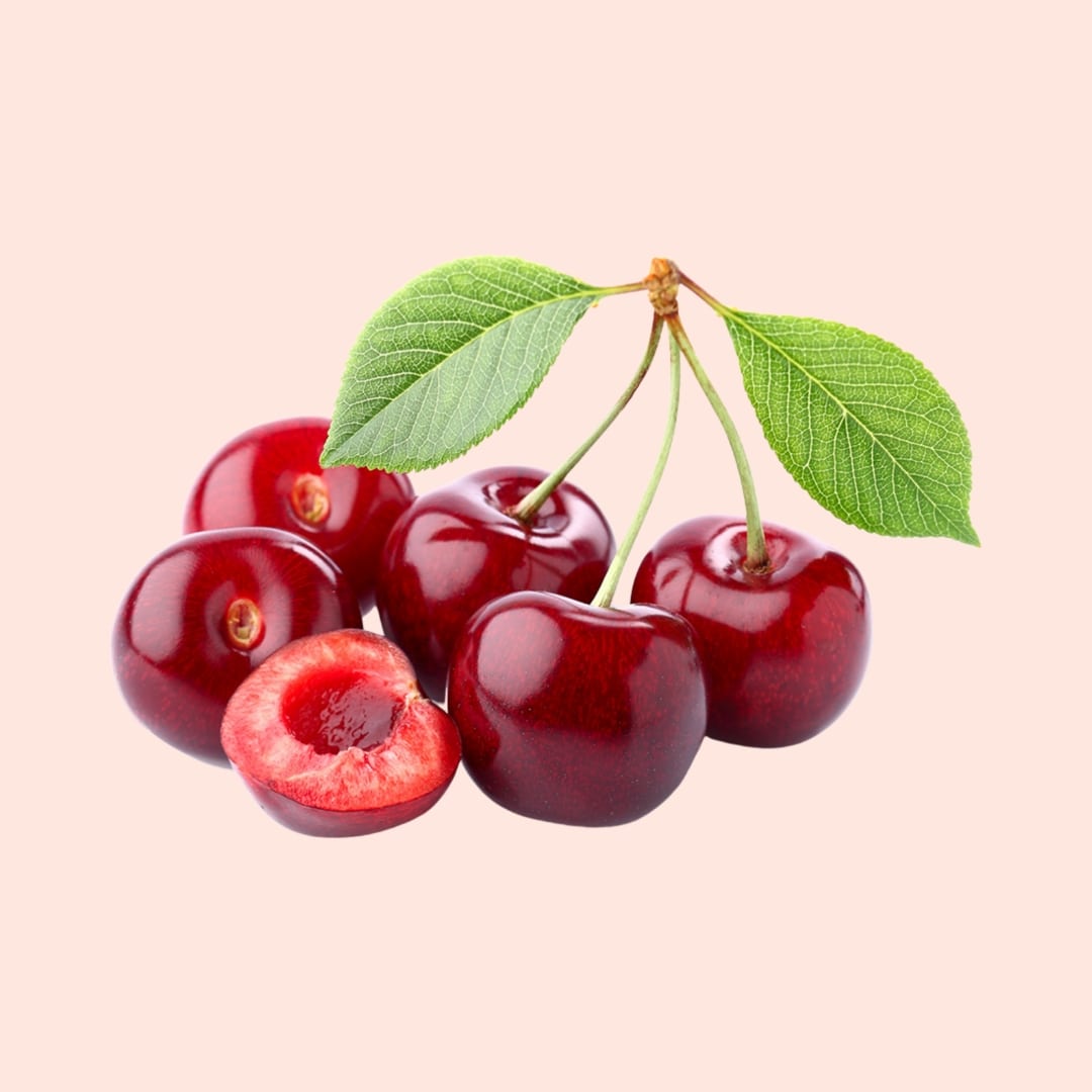 Bunch of cherries with a pink background