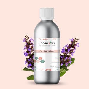 Bottle of Raasa Oils Clary Sage Hydrosol with floral elements on a light pink background