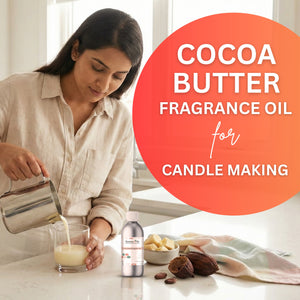 Woman pouring liquid into a glass with cocoa butter fragrance oil for candle making on a table.