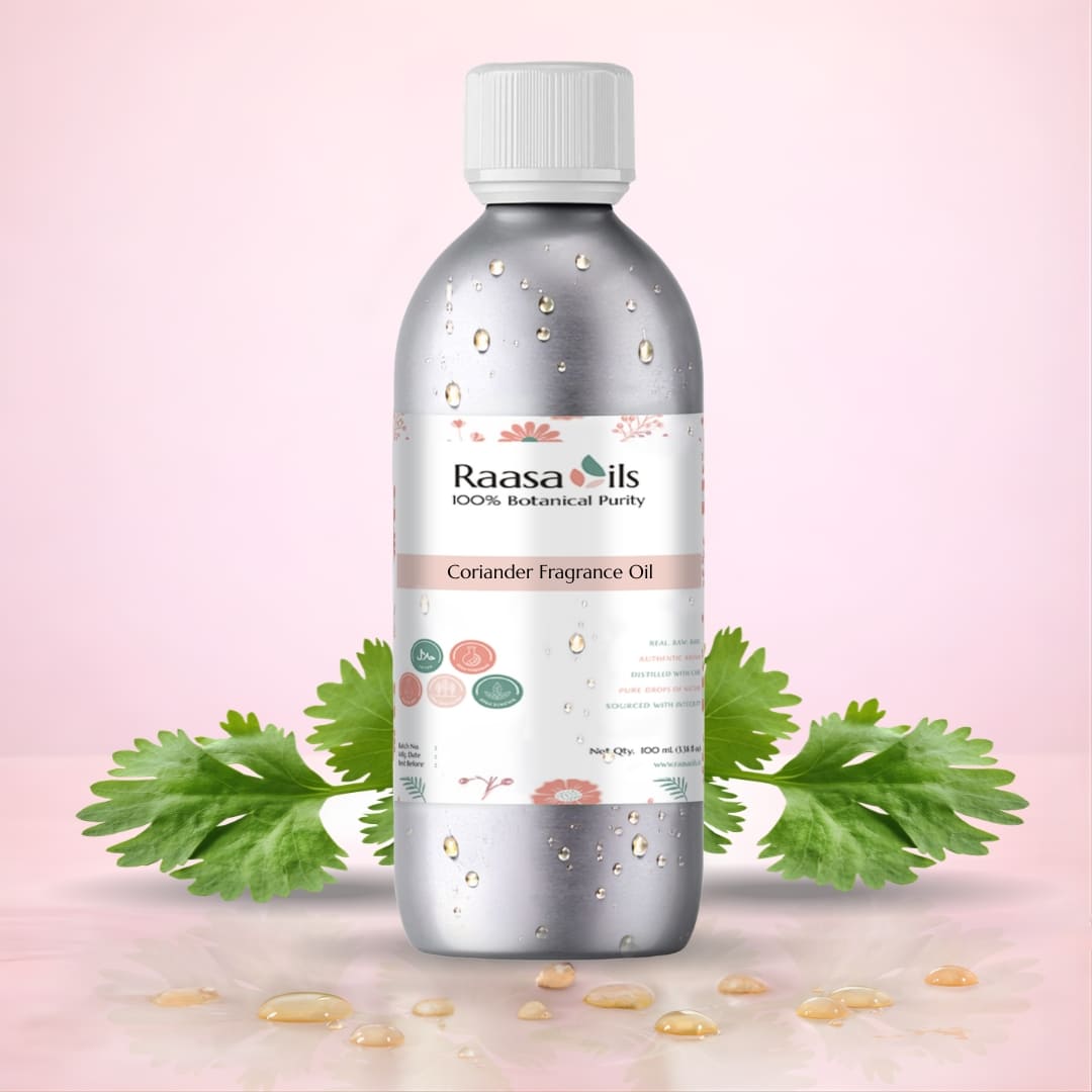 Bottle of Raasa Oils Coriander Fragrance Oil with coriander leaves on a pink background