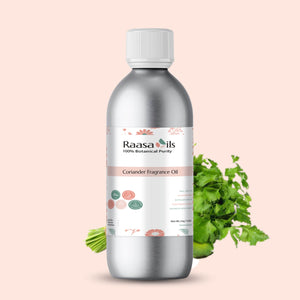 Bottle of Raasa Oils Coriander Fragrance Oil with coriander plant on a beige background