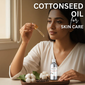 Woman holding a dropper with cottonseed oil and a bottle of cottonseed oil on a table.