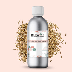 Bottle of Raasa Oils Cumin Seed Liquid Extract surrounded by cumin seeds on a beige background