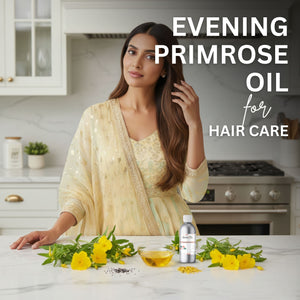 Woman with long hair in a kitchen setting with evening primrose oil and flowers on the counter.