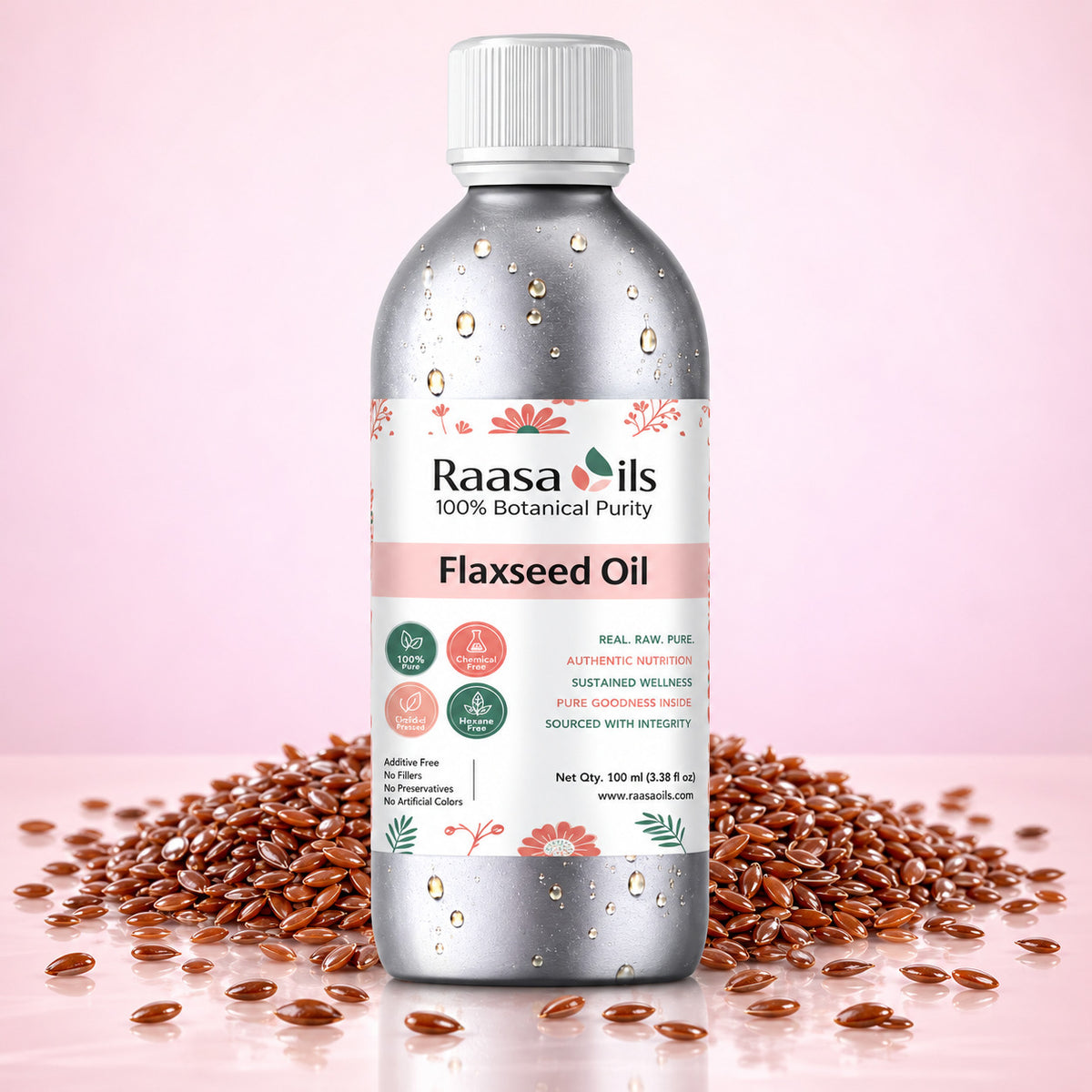 A bottle of Raasa oils 100% Botanical Purity Flaxseed Oil, shown with scattered flaxseeds on a soft pink background.