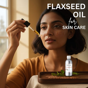 Woman applying flaxseed oil to her face with a dropper, surrounded by flaxseeds on a wooden tray.
