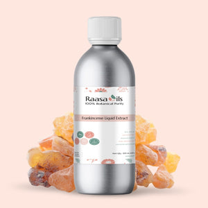 Bottle of Raasa Oils Frankincense Liquid Extract with frankincense resin on a beige background