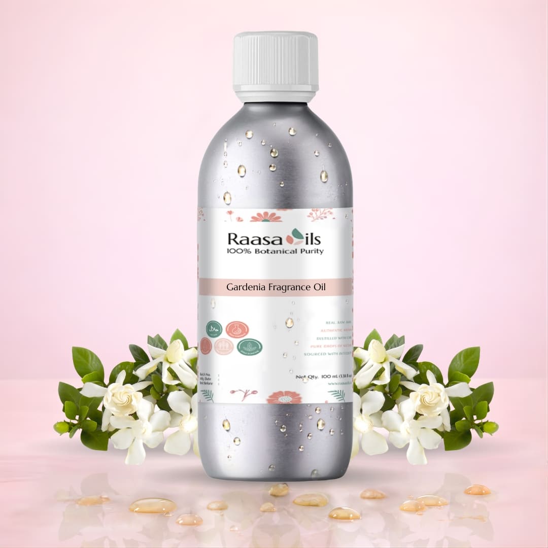 Raasa Oils Gardenia Fragrance Oil bottle with flowers on a pink background