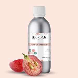 Bottle of Raasa Oils Grape Seed Liquid Extract with a pink background