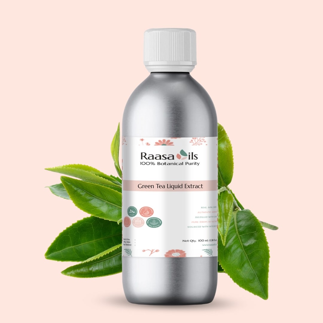 Bottle of Raasa Oils Green Tea Liquid Extract with green leaves on a beige background