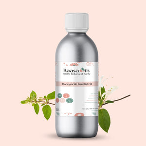 Bottle of Raasa Oils Honeysuckle Essential Oil on a light pink background