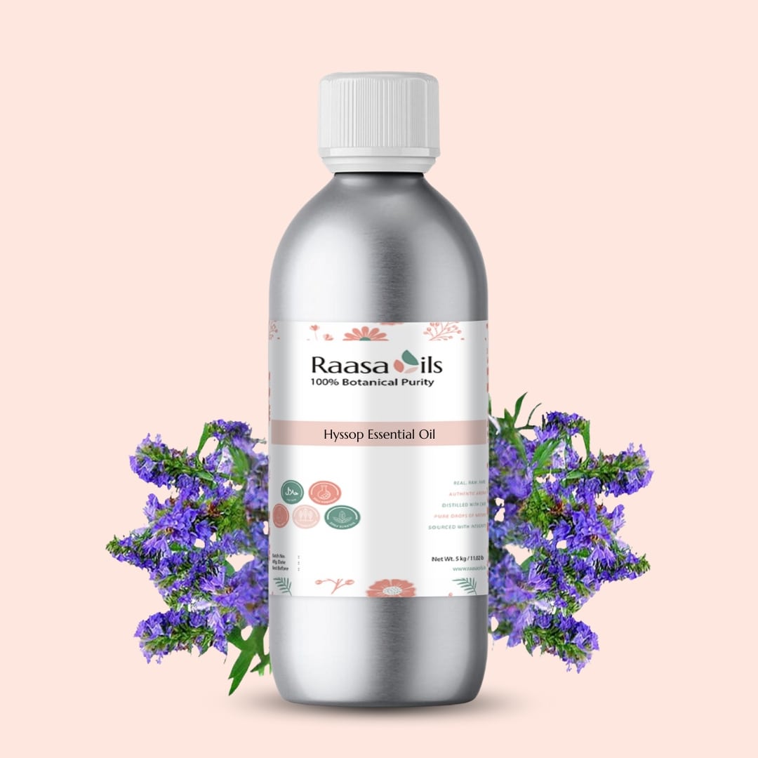 Bottle of Raasa Oils Hyssop Essential Oil with purple flowers on a light pink background