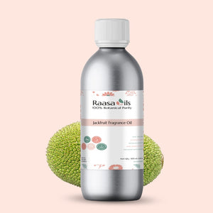 Bottle of Raasa Oils Jackfruit Fragrance Oil with a pink background