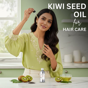 Woman with kiwi seed oil for hair care in a kitchen setting
